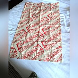 Gillian Kyle tea towel. Advertising of Tunnock Caramel bar. Scotland.